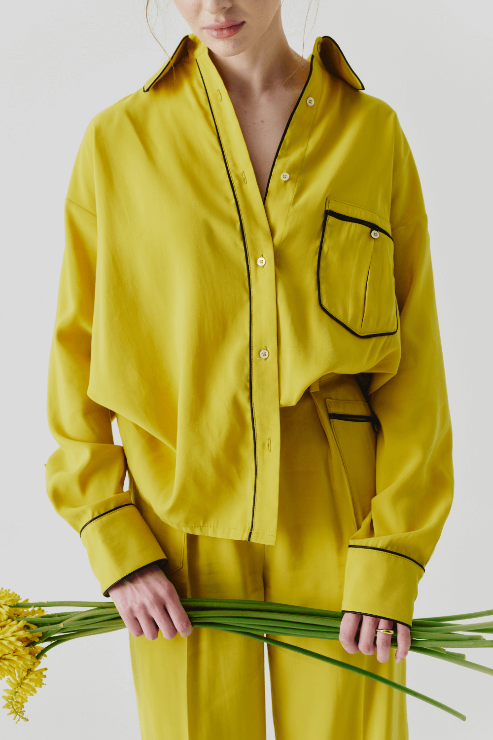 The suit is yellow pajamas