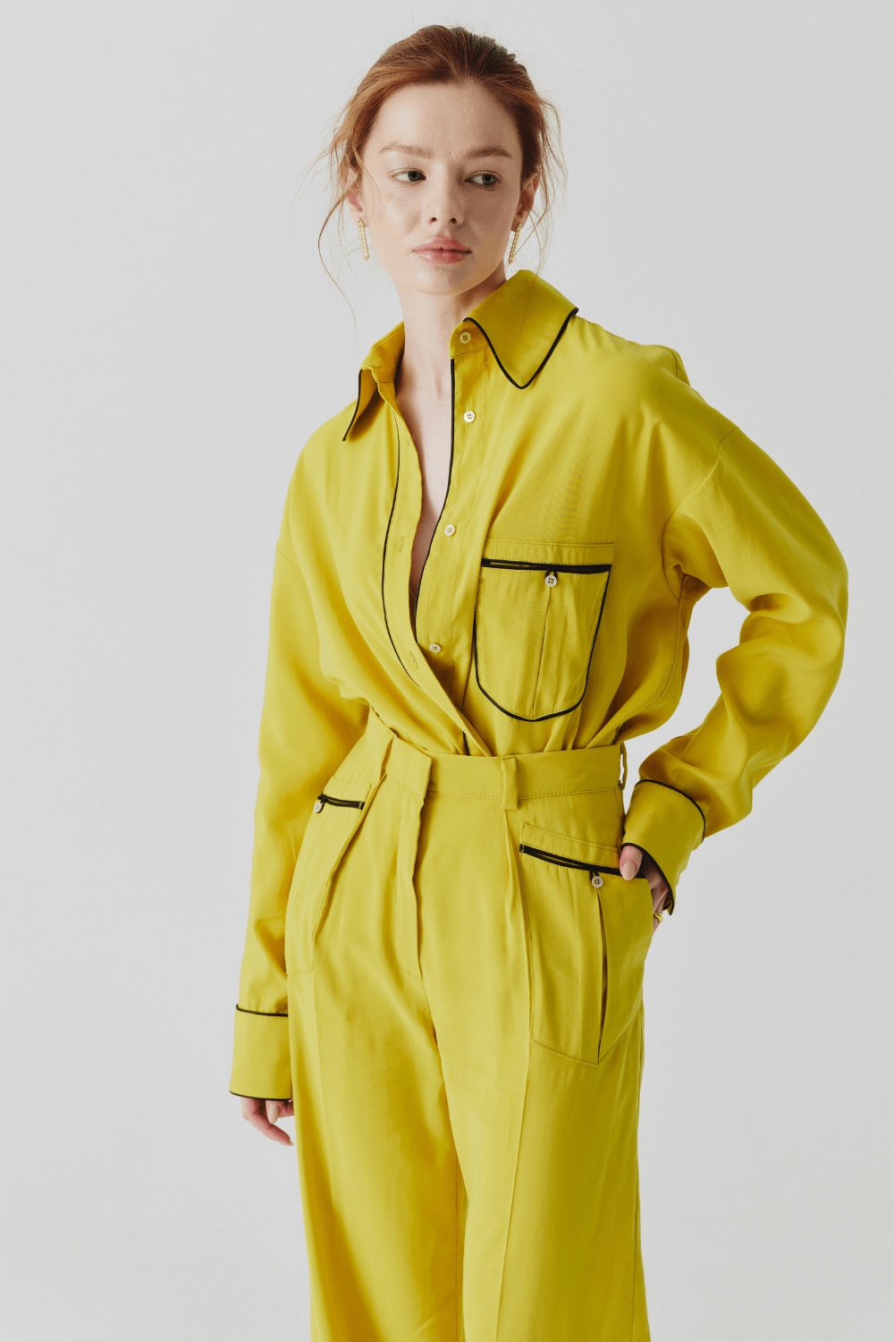 The suit is yellow pajamas
