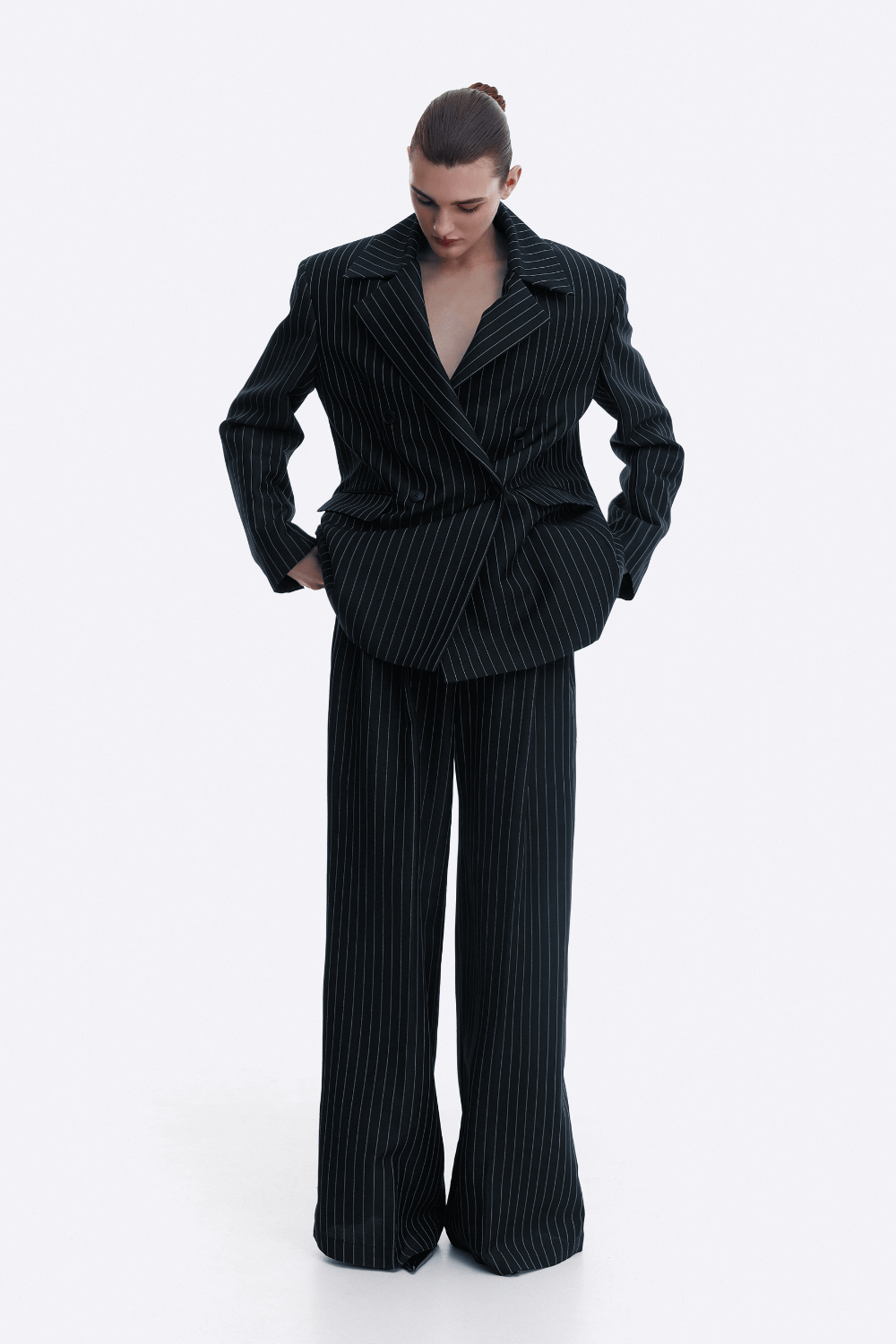 Брюки чорні у смужку