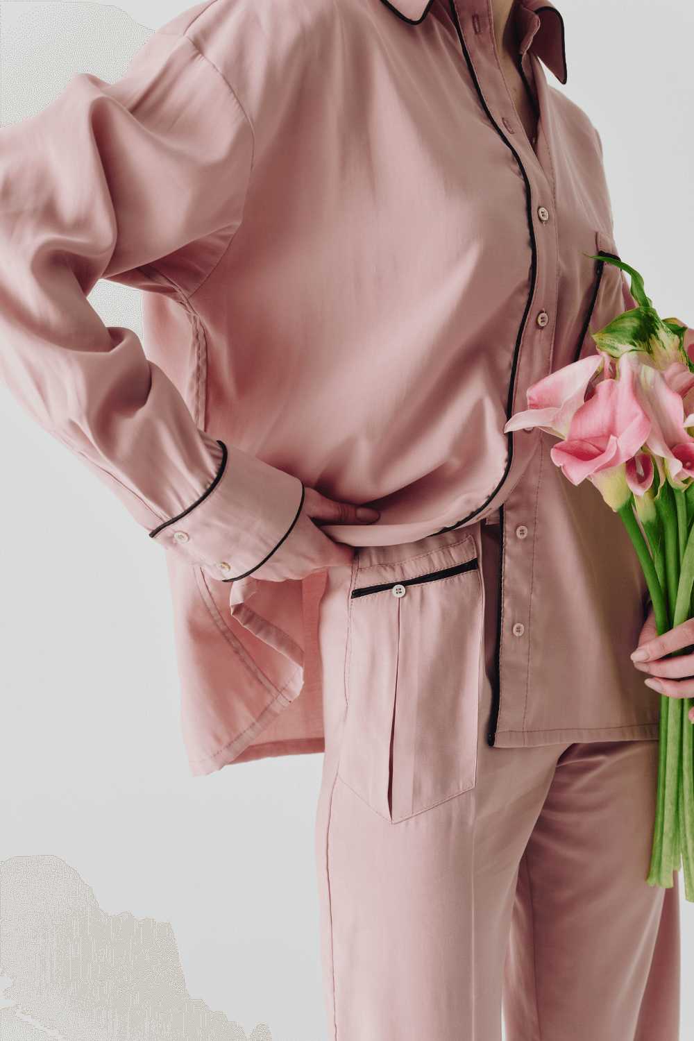 The suit is pink pajamas