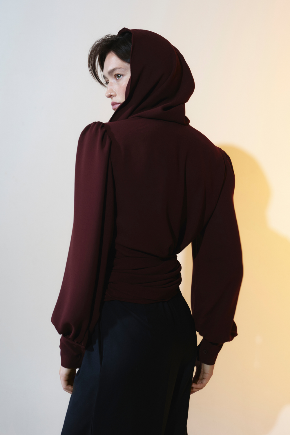 Burgundy blouse with a hood - the highlight of the collection