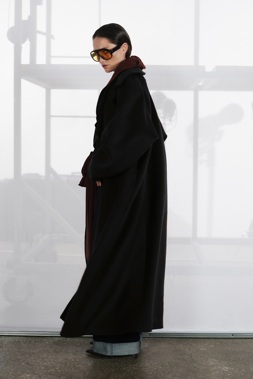 Black long coat with a low waist