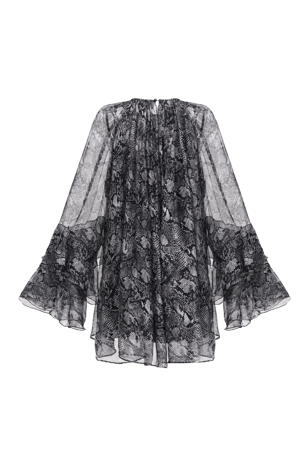 Прозора сукня зі зміїним принтом