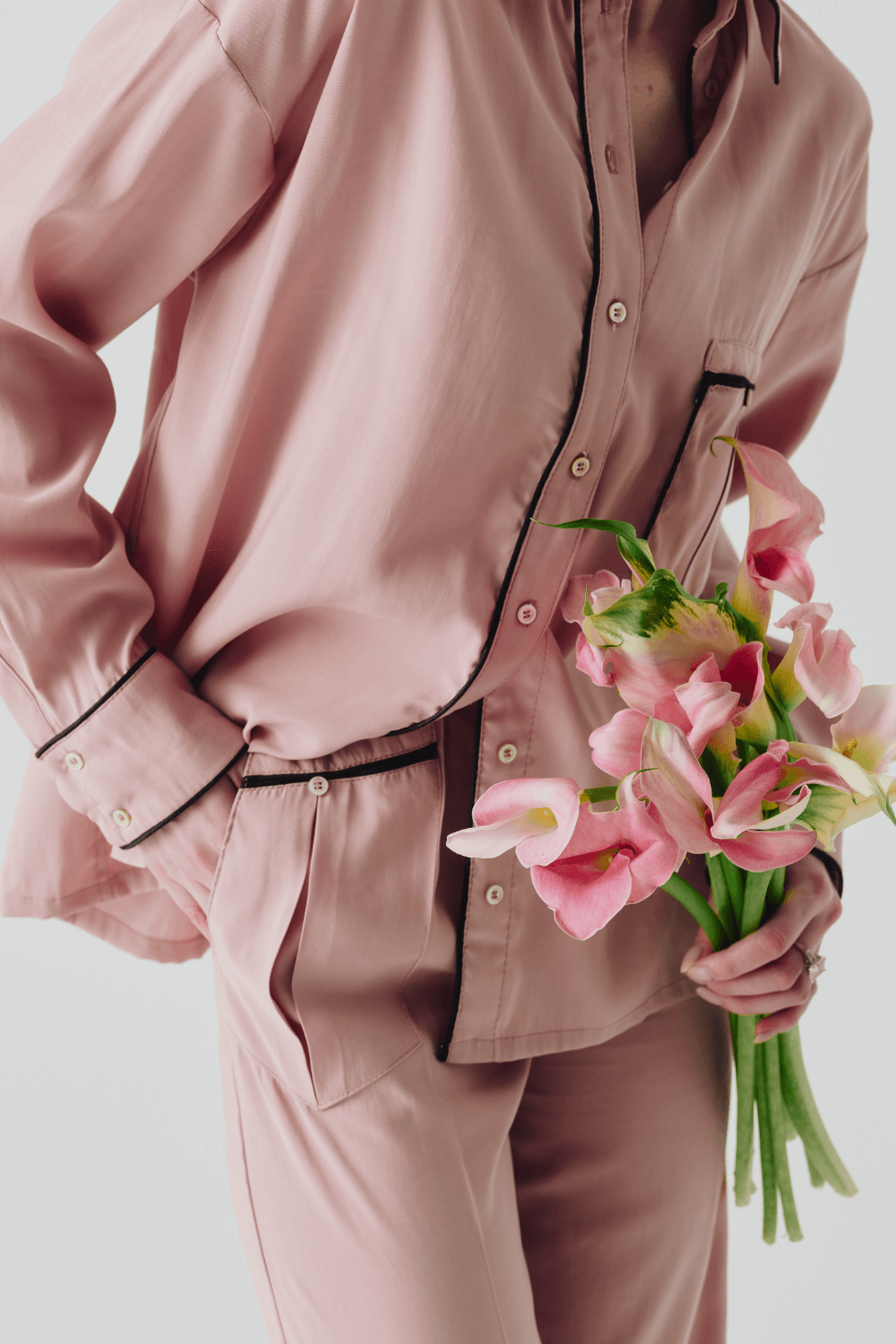 The suit is pink pajamas