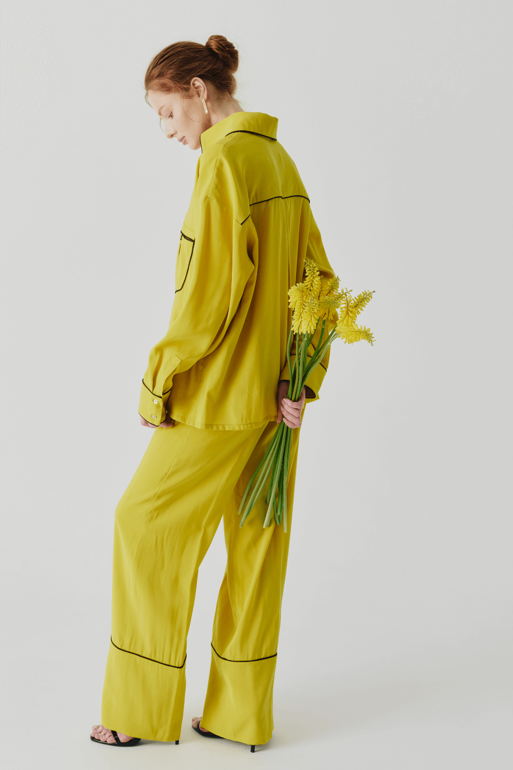 The suit is yellow pajamas