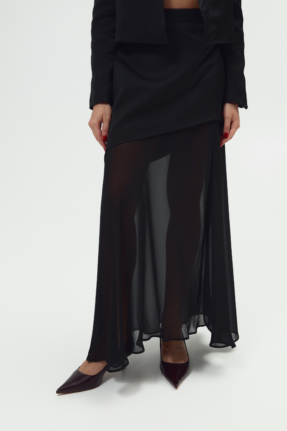 The skirt is short black