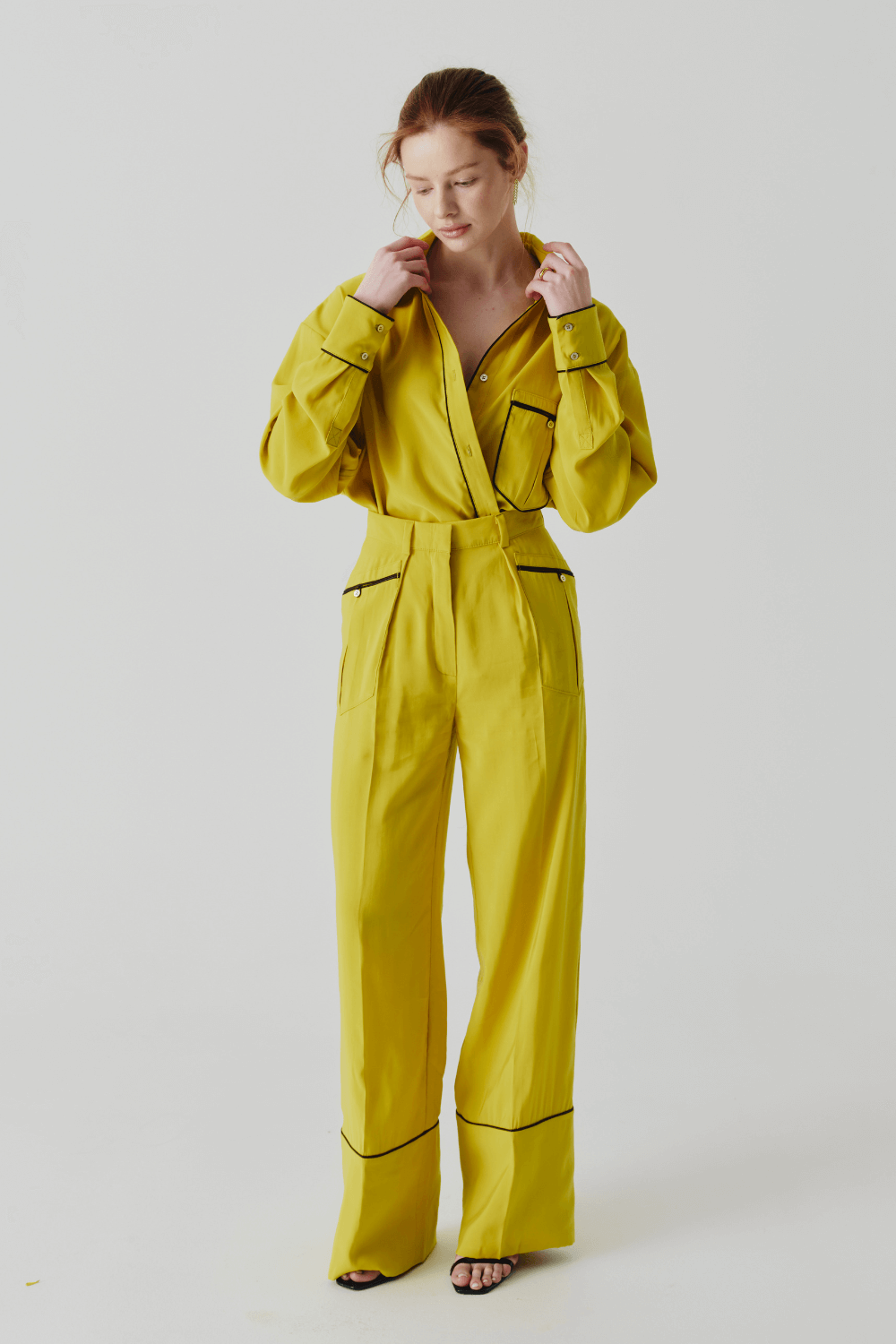 The suit is yellow pajamas