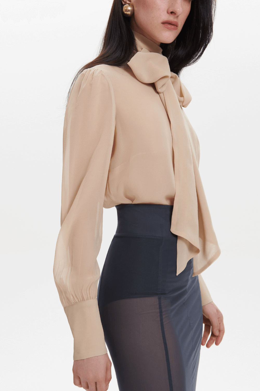 Beige blouse with bow