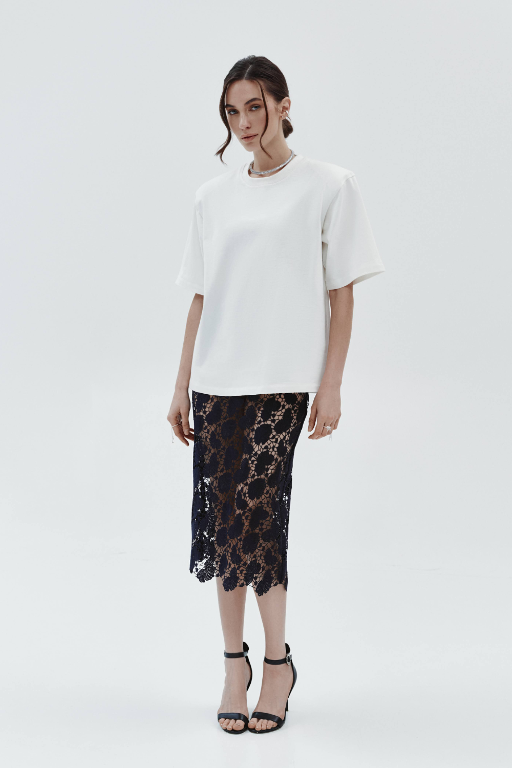 Midi skirt is dark blue