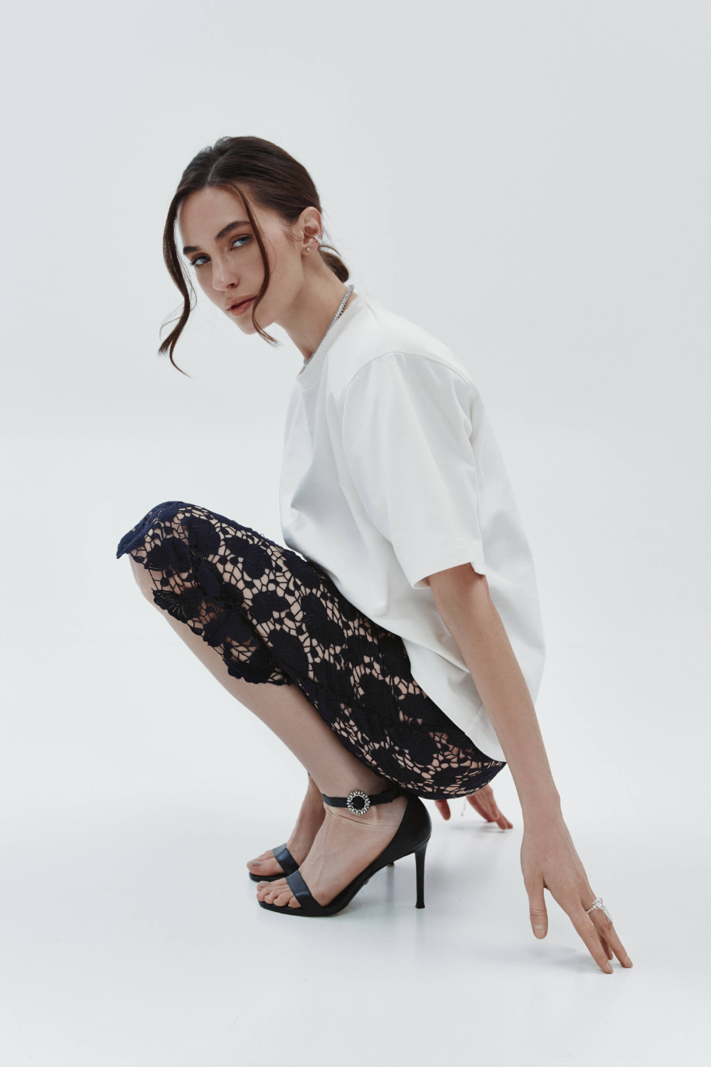 Midi skirt is dark blue