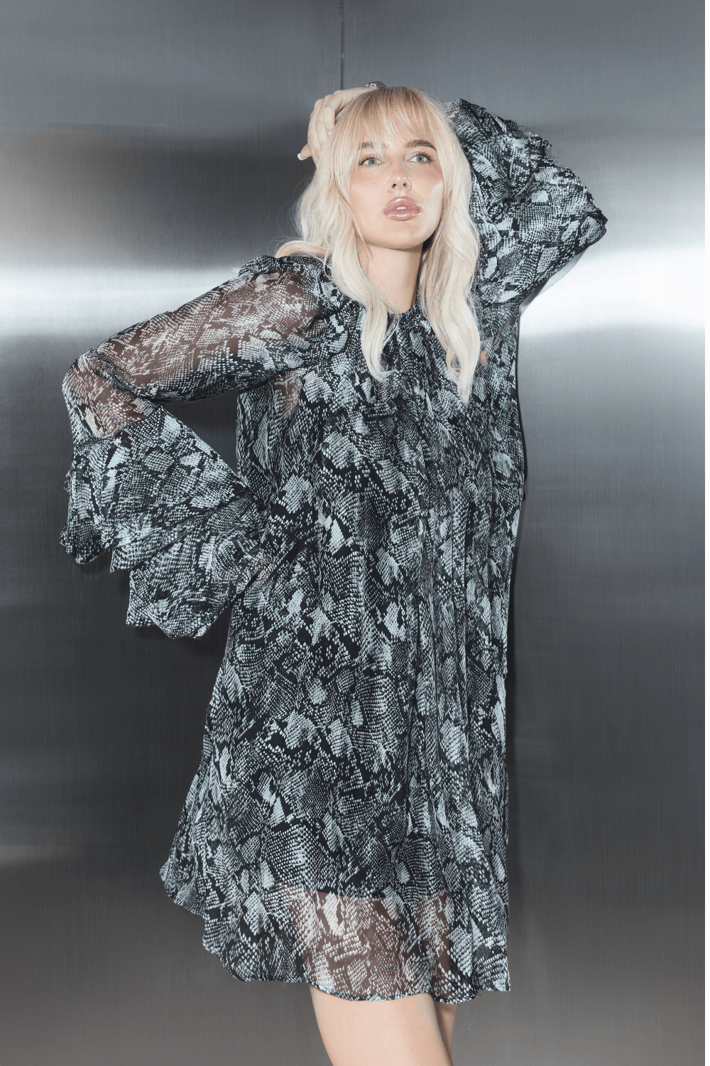 Sheer dress with snake print